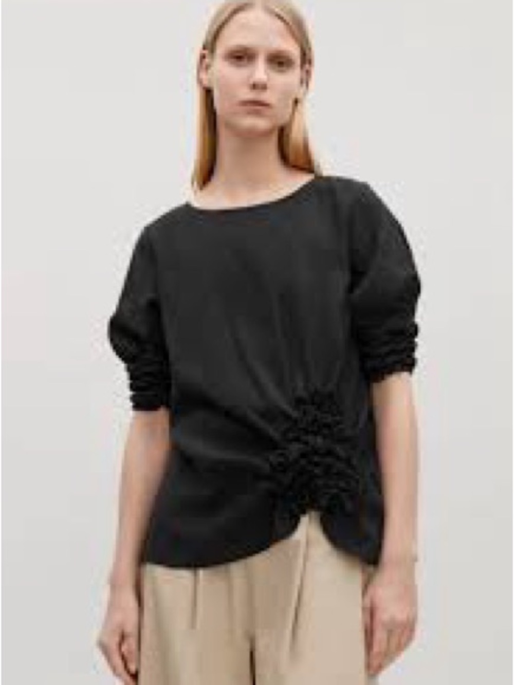 COS blouse with gathered and draped details on the front and sleeves